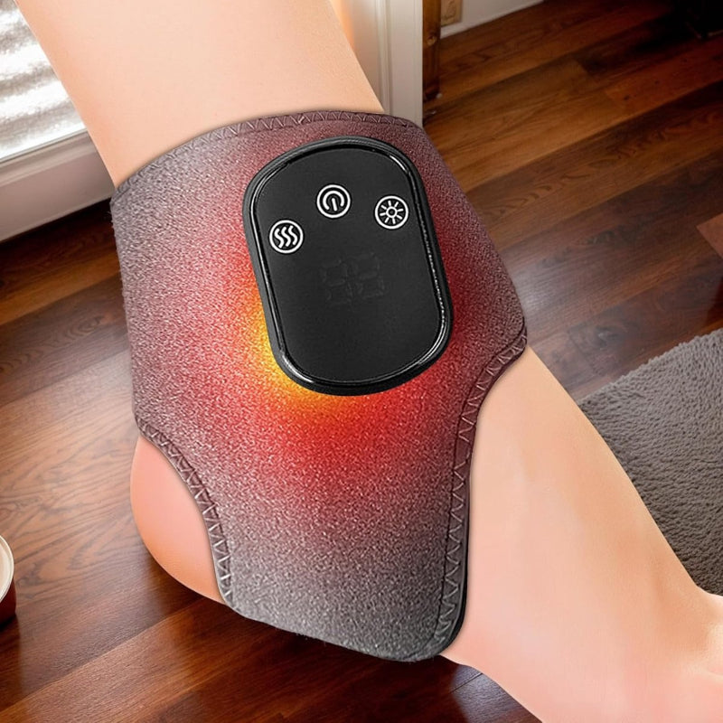 Heated knee brace with control panel on a wooden floor